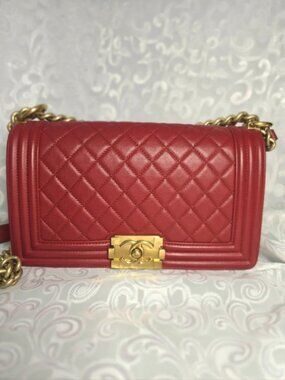 CHANEL Old Medium, Red Quilted Boy Bag with Iconic CC push-lock claps